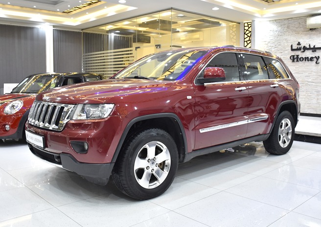 EXCELLENT DEAL for our Jeep Grand Cherokee Limited 4x4 ( 2013 Model ) in Red Color GCC Specs