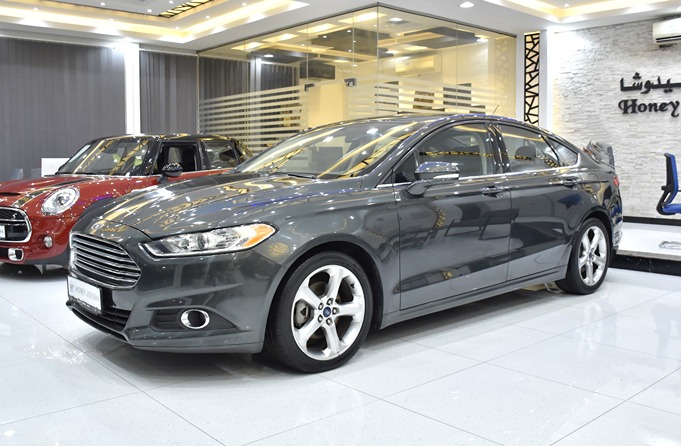 EXCELLENT DEAL for our Ford Fusion SE ( 2016 Model ) in Grey Color GCC Specs