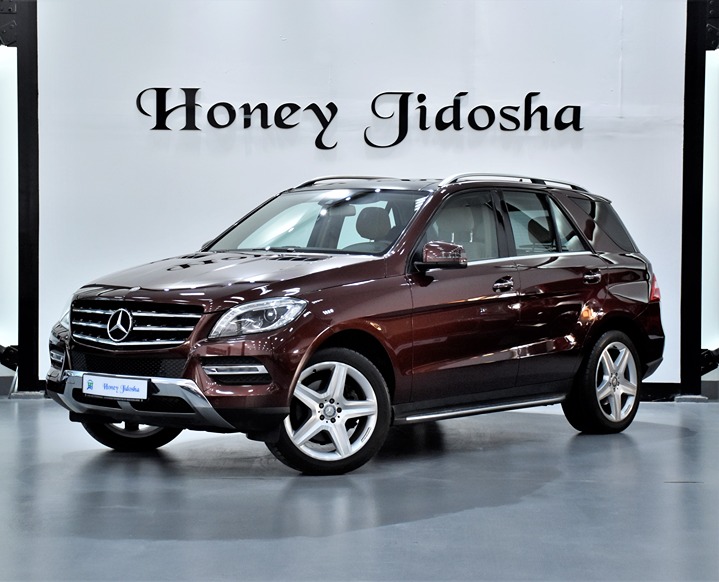 EXCELLENT DEAL for our Mercedes Benz ML350 ( 2014 Model ) in Burgundy Color GCC Specs